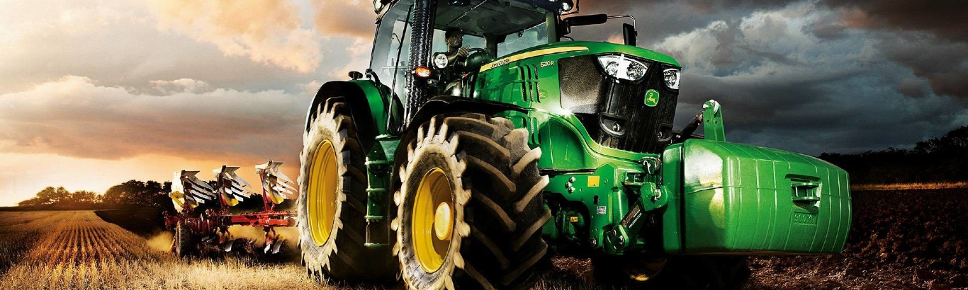 Tractor harvesting.